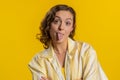 Cheerful funny bully young woman showing tongue making silly faces, fooling around, joking, teasing Royalty Free Stock Photo