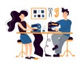 A cheerful girl and a beautiful brunette guy sew together on a sewing machine, create designer clothes with their own hands.