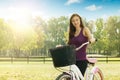 Cheerful girl with a bicycle Royalty Free Stock Photo