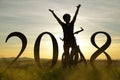 Cheerful girl on a bike. Concept of the New Year 2018. Royalty Free Stock Photo