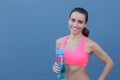 Cheerful girl with a bottle of water Royalty Free Stock Photo