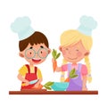Cheerful Girl and Boy Chef Characters Wearing Apron and Hat Chopping Carrot on Cutting Board Vector Illustration