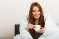 Cheerful girl drinking coffee. Royalty Free Stock Photo