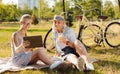 Cheerful girl having a picnic with her grandmother Royalty Free Stock Photo