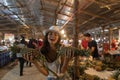 Cheerful Girl Hold Pineapples Shopping On Tropical Street Market In Thailand Young Woman Tourist Buying Fresh Fruits