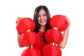 Cheerful girl holding red lanterns, closeup portrait on white background Royalty Free Stock Photo