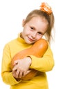 Cheerful girl hugs a pumpkin Royalty Free Stock Photo