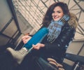 Cheerful girl on ice skating rink Royalty Free Stock Photo