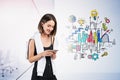 Cheerful girl with phone in office, business plan Royalty Free Stock Photo