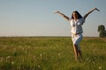 Cheerful girl on the summer field Royalty Free Stock Photo