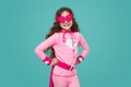 Cheerful girl in superhero outfit in studio Royalty Free Stock Photo