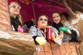 Cheerful girls with animal prints on a carnival cart during the carnival parade in Boskoop