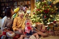 Cheerful grandmather and little girl together for Christmas