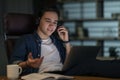 Cheerful guy project manager have online meeting late at night Royalty Free Stock Photo