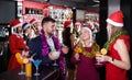 Guy with two girls on new year party in bar