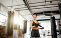 Cheerful gymnast with ideal body at fitness club