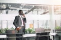 Cheerful handsome african american businessman talking on phone Royalty Free Stock Photo