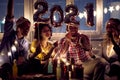 Cheerful and happy couples celebrating New Year eve. New Year, home party, friends time together Royalty Free Stock Photo