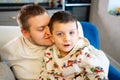 cheerful and happy dad and son fool around and play at home. family happiness. Royalty Free Stock Photo