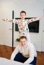 cheerful and happy dad and son fool around and play at home. family happiness. Royalty Free Stock Photo