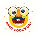 Cheerful happy face in glasses with a mustache on April Fool`s Day.