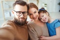 Cheerful happy family mother father and child take selfies, take pictures Royalty Free Stock Photo