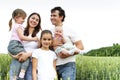 Cheerful happy family in wheat field Royalty Free Stock Photo