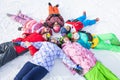 Cheerful happy friends lying in a circle Royalty Free Stock Photo