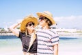 Cheerful and happy people young caucasian couple of tourist enjoy the summer vacation together in relationship and friendship - Royalty Free Stock Photo