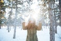 Cheerful happy woman having fun with snow in winter park Royalty Free Stock Photo