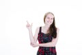 Cheerful happy young friendly woman blonde smiling looking pointing side fingers at someone or promo in copy space on white Royalty Free Stock Photo