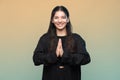 Cheerful hippy woman 29s calmly smiling and meditating. Bright future ahead Royalty Free Stock Photo