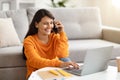 Cheerful indian woman independent contractor working from home Royalty Free Stock Photo