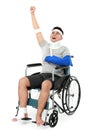 Cheerful injured young man raise his hand