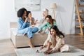 cheerful interracial women doing beauty procedures