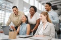 Cheerful, joyful professional business people looking at laptop, browsing funny videos online and bonding on break in Royalty Free Stock Photo