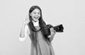 cheerful kid girl take photo with digicam show ok gesture, photography Royalty Free Stock Photo