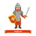 Cheerful kid in knights armour with helmet