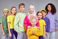 cheerful kids in fashion stylish clothes standing in row Royalty Free Stock Photo