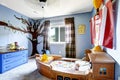 Cheerful kids room with boat bed