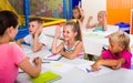 Cheerful kids at school lesson Royalty Free Stock Photo