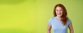 Cheerful kind happy redhead middle-aged mother look caring delighted smiling broadly gaze admiration joy stand blue t