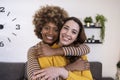 Cheerful lesbian couple having fun together and looking at camera. Portrait of a smiling young girls hugging each other Royalty Free Stock Photo