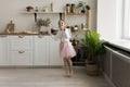 Cheerful little ballet dancer girl dancing at home Royalty Free Stock Photo