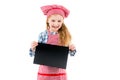 Little girl in chef uniform with blank paper Royalty Free Stock Photo