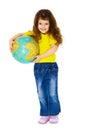 Cheerful little girl with a geographic globe Royalty Free Stock Photo