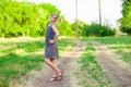 Cheerful little girl on a green grass Royalty Free Stock Photo