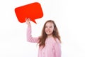 Cheerful little girl holding red empty speech bubble over white background Royalty Free Stock Photo