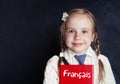 Cheerful little girl learning french. Learning french language Royalty Free Stock Photo