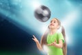 Cheerful little girl plays with soccer ball Royalty Free Stock Photo